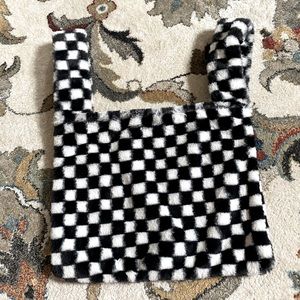 Black and white checkered fuzzy purse